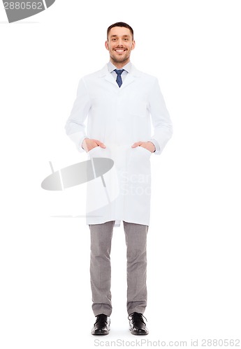 Image of smiling male doctor in white coat