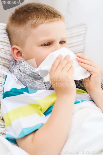 Image of ill boy with flu at home