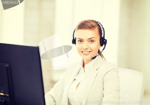 Image of friendly female helpline operator