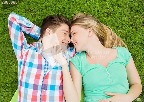 Image of smiling couple in park