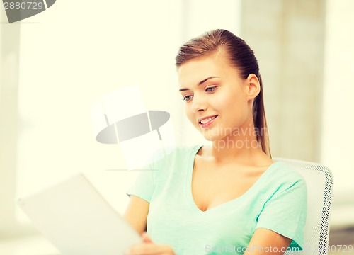 Image of smiling student girl with tablet pc