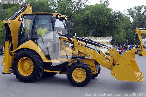 Image of City Day of Tyumen, on July 26, 2014, show of dancing excavators