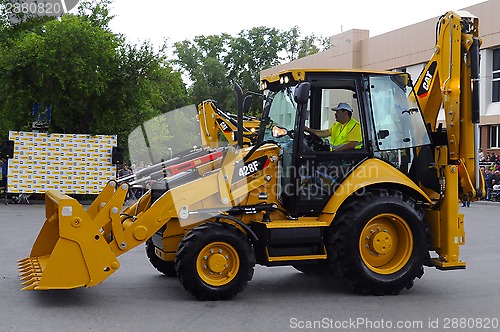 Image of City Day of Tyumen, on July 26, 2014, show of dancing excavators