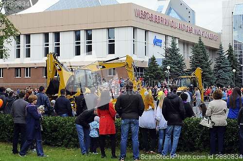 Image of City Day of Tyumen, on July 26, 2014, show of dancing excavators