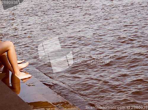 Image of Retro look Girls legs bathing