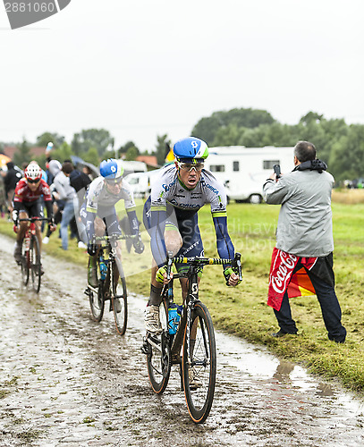 Image of The Cyclist Mathew Hayman on a Cobbled Road - Tour de France 201