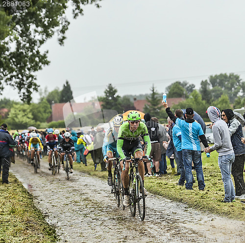 Image of The Cyclist Bauke Mollema on a Cobbled Road - Tour de France 201