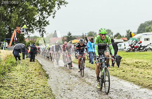 Image of The Cyclist Lars Boom on a Cobbled Road - Tour de France 2014