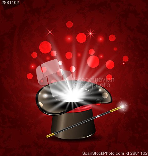 Image of Magician hat, wand and magical glow