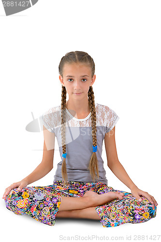 Image of Girl sitting in the lotus position