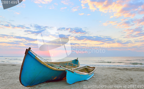 Image of Fishing boats and sunrise 