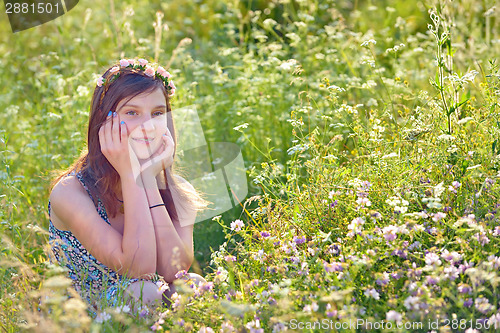 Image of  girl with wreath from flowers