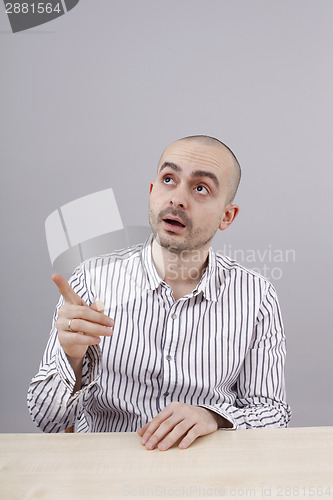 Image of Man at desk