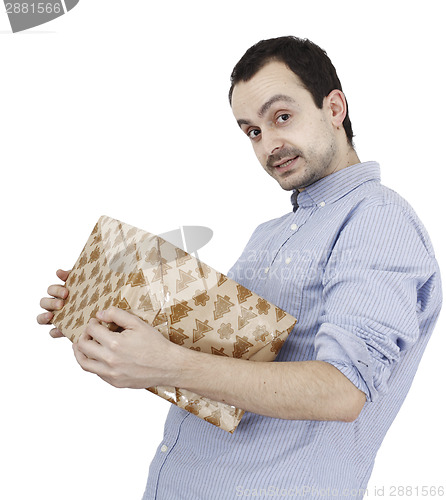 Image of Young man holding a present