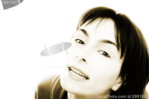 Image of Young woman in bed