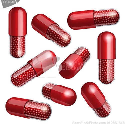 Image of Medical red capsule with granules