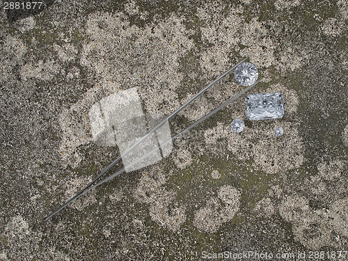 Image of diamonds over old cement