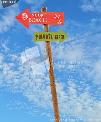 Image of wooden post nude and private beaches
