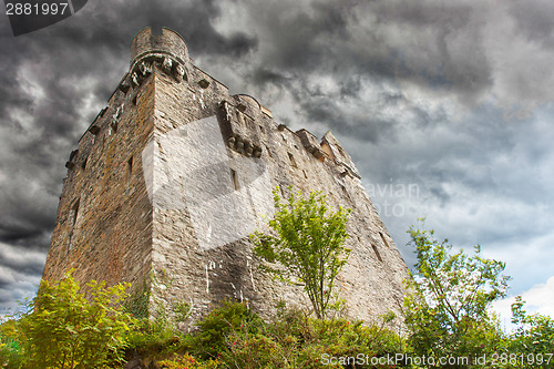 Image of Stormy sky over castle