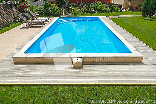 Image of Swimming pool in the yard of a private home.