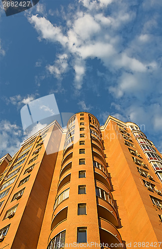 Image of Fragment of an apartment house on sky background.