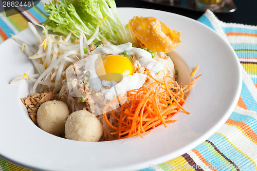 Image of Thai Noodle Dish with Fried Egg