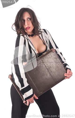 Image of Attractive woman with suitcase