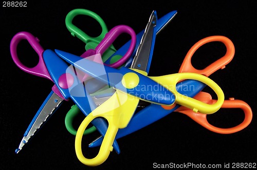 Image of Colorful Scissors on Black Background