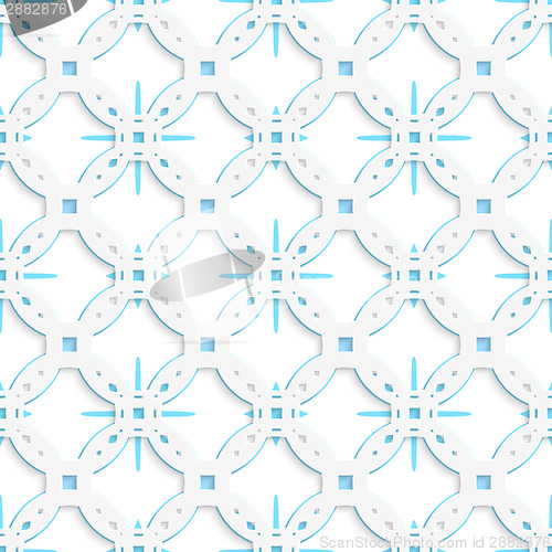 Image of White perforated ornament with blue snowflakes seamless