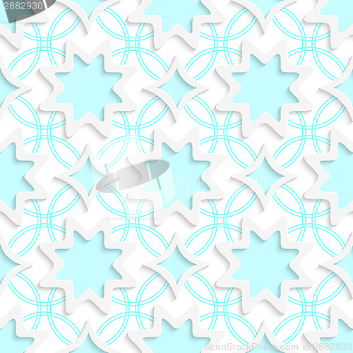 Image of White snowflakes and white rhombuses on flat blue ornament seaml