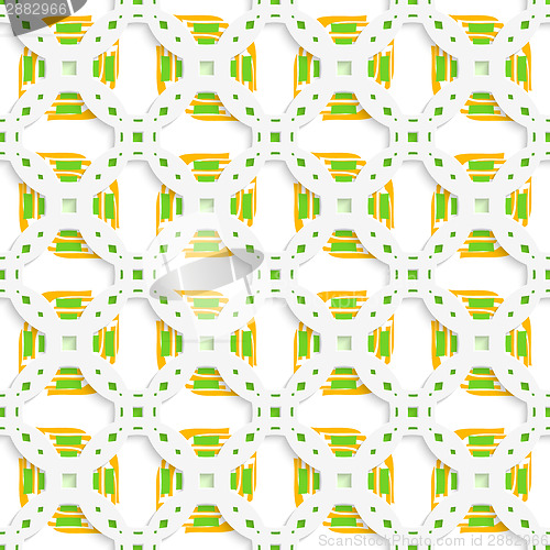 Image of White perforated ornament with green orange seamless