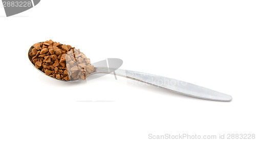 Image of Metal teaspoon measure of instant coffee granules