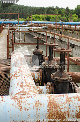 Image of Rusty taps and pipes. water treatment plant 