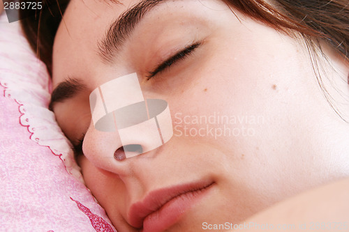 Image of Beautiful young woman sleeping.