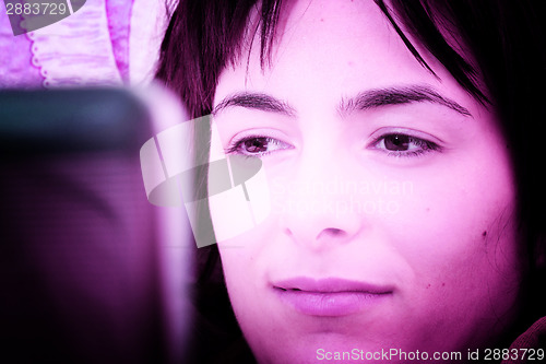 Image of Young woman with laptop 
