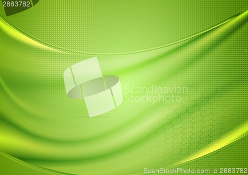 Image of Bright blurred green waves design