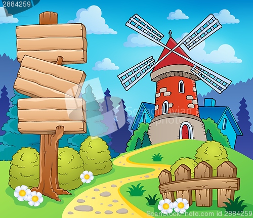 Image of Scenery with sign and windmill