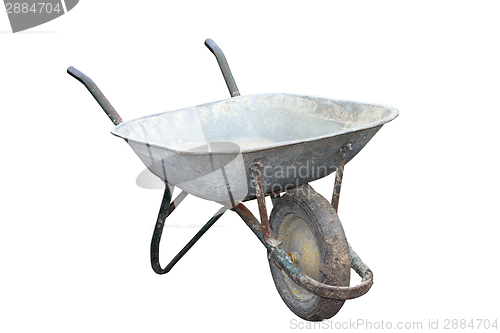 Image of old muddy wheelbarrow