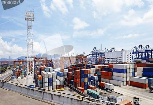 Image of Port warehouse with containers and industrial cargoes