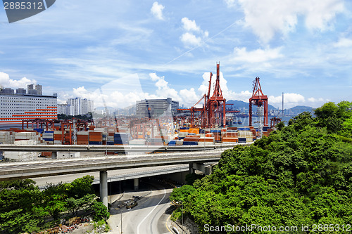 Image of Port warehouse with containers and industrial cargoes