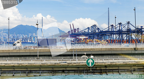 Image of Port warehouse with containers and industrial cargoes