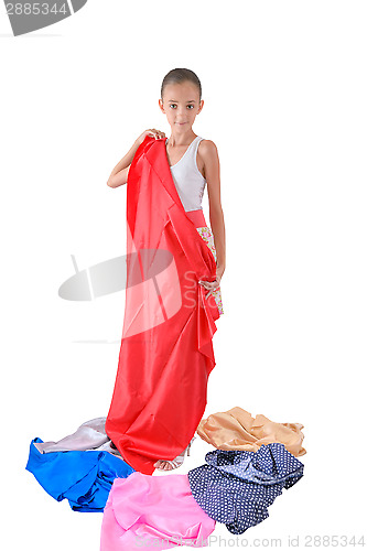 Image of The girl tries on fabric