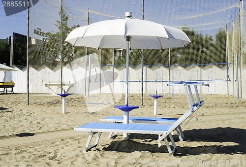 Image of Sunbeds and umbrellas on the beach