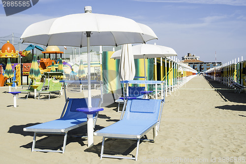 Image of Sunbeds and umbrellas on the beach