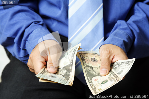 Image of Businessman and money