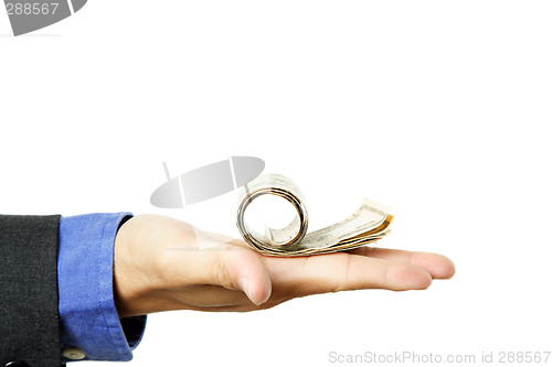 Image of Businessman with cash on hand