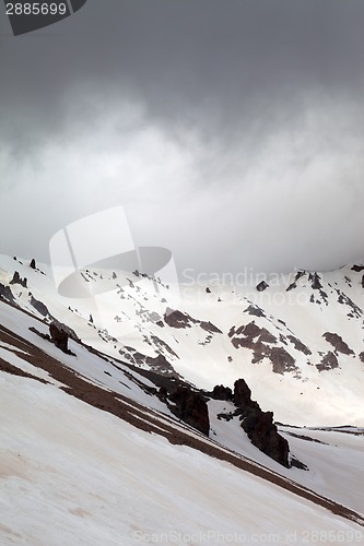 Image of Snowy mountains in bad weather