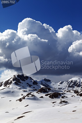 Image of Snowy mountains and sky with clouds