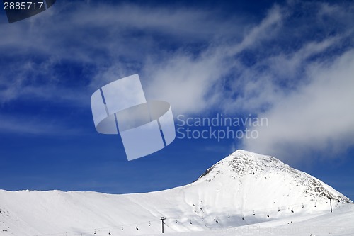 Image of Ski resort at sun winter day