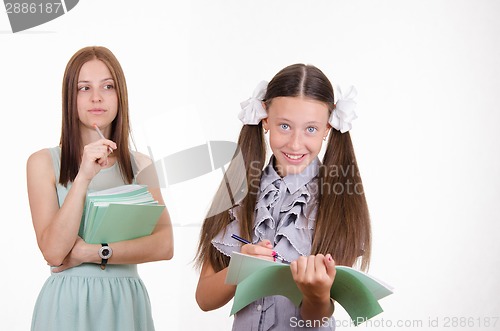 Image of Teacher warily looking at prospective student